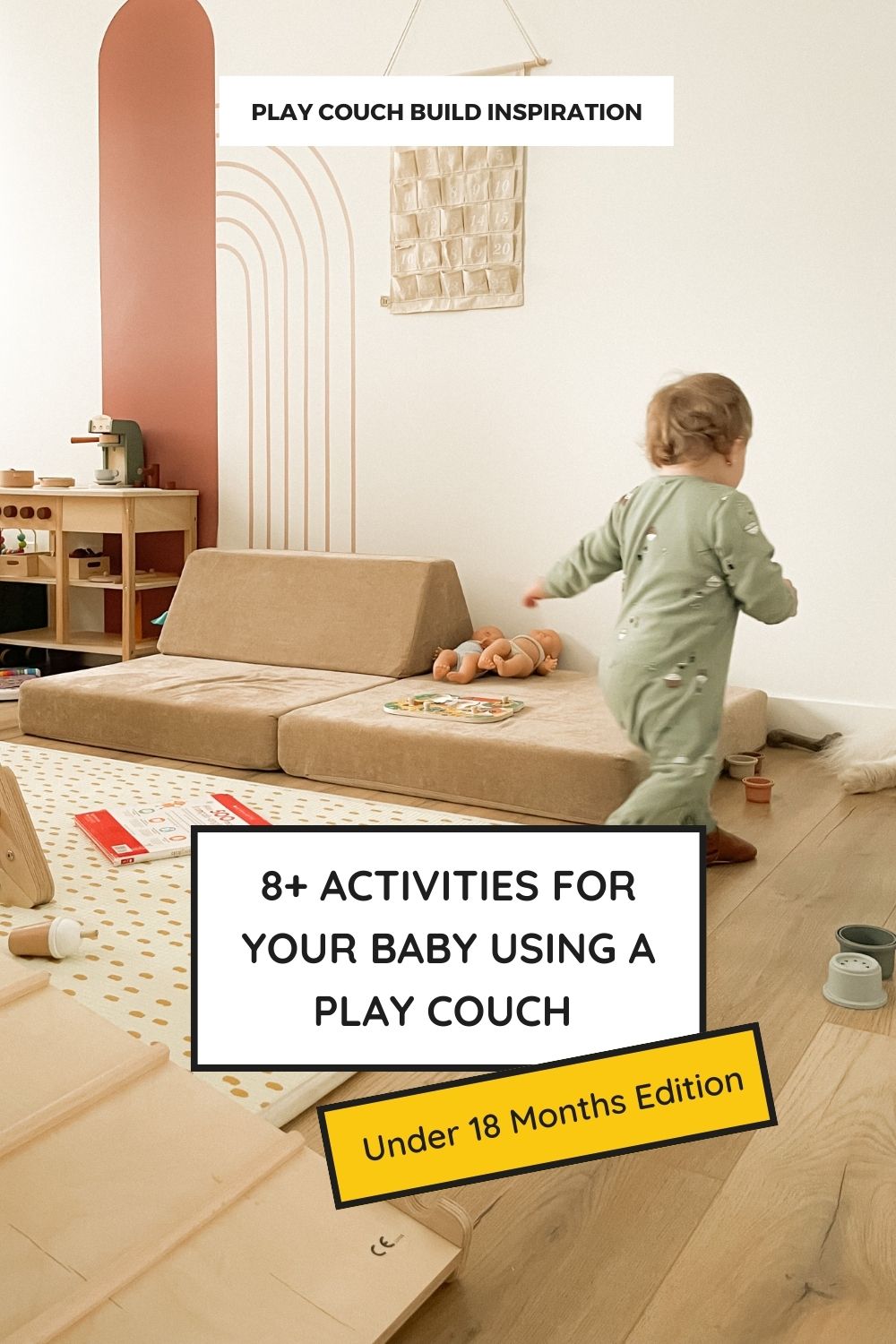 a toddler running on a neutral decor playroom with toys and a play couch in the middle